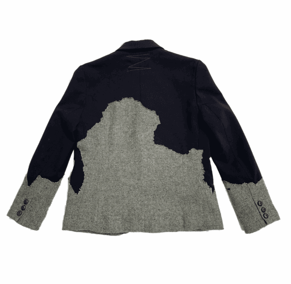 The torn jacket – Image 2